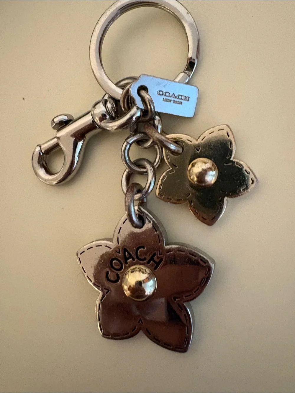 COACH Silver & Bronze Flower Charm Key Ring with Silver Hardware